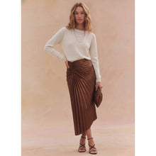 Load image into Gallery viewer, BLACK FAUX LEATHER ASYMMETRICAL HEM STARBURST PLEATING MIDI SKIRT