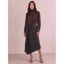 Load image into Gallery viewer, BLACK FAUX LEATHER ASYMMETRICAL HEM STARBURST PLEATING MIDI SKIRT
