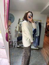 Load image into Gallery viewer, Oversized turtleneck knit sweater with front detail
